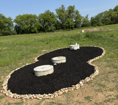 back-yard-mulch-after Figure eight garden with completed mulch installation in back yard.
